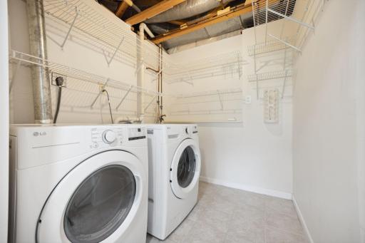 Ample storage space in the laundry room and newer washer and dryer.