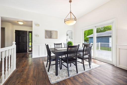 The dining room accesses the maintenance deck built in 2023. Perfect for indoor/outdoor life in the summer.