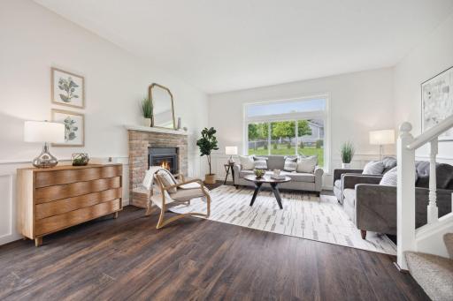 The spacious living room overlooks the large backyard. You'll love the 10' ceilings.