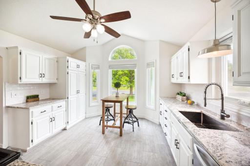 Timeless and functional kitchen with vaulted ceilings and tons of natural light.