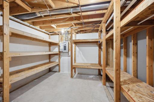 The additional storage room has built-in wood shelves all ready for you.