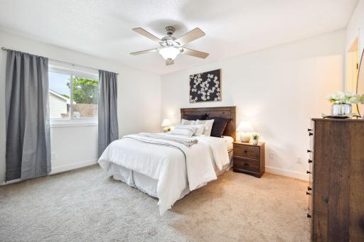 The primary bedroom offers plenty space for your multi piece bedroom sets and an ensuite bathroom.