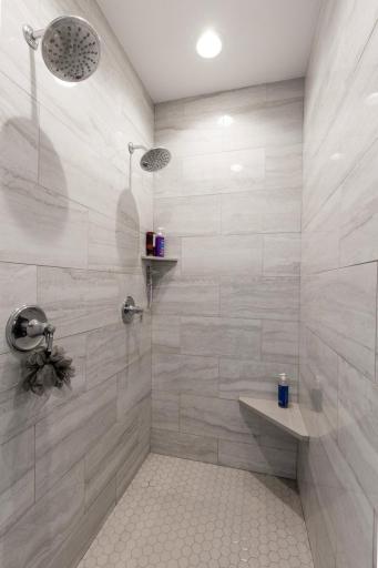 Primary Walk-In Shower with dual shower heads.