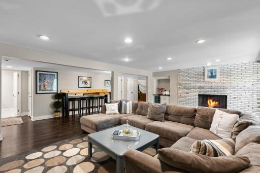 Beautiful brick fireplace on lower level.