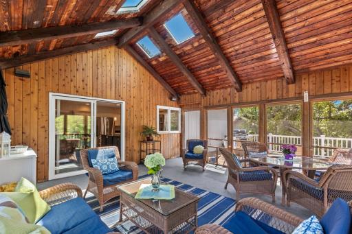 Screened-in porch with a treehouse feel â a serene, elevated space to relax and unwind.