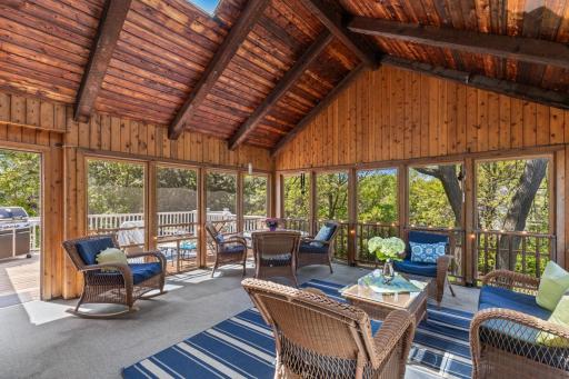 Screened-in porch with a treehouse feel â a serene, elevated space to relax and unwind.