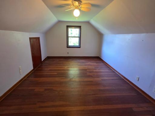 Very large upstairs bedroom with many storage areas.