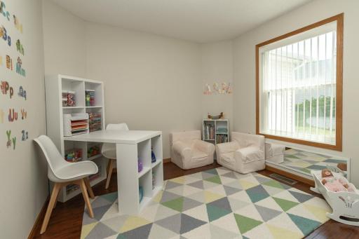 Versatile main-level 11' x 10' room can be used as a bedroom, home office, study or playroom.