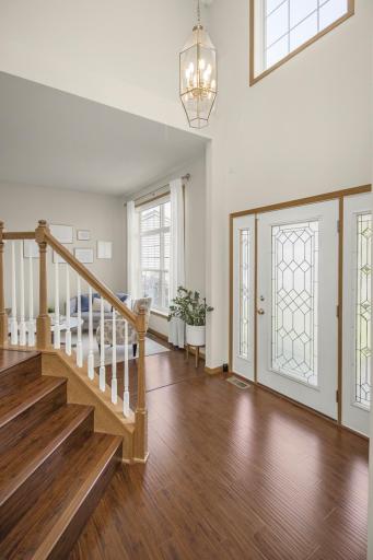 Step inside to a dramatic two-story 17' vaulted foyer.