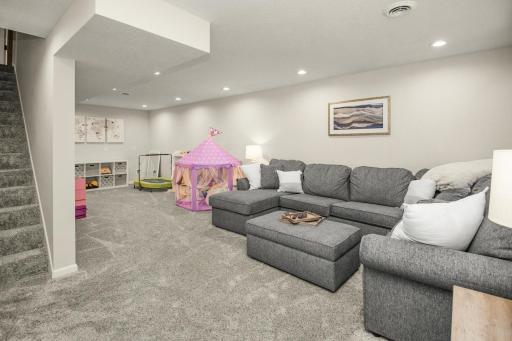 Licensed contractor finished lower-level-2020. Rough-in for wet bar and bar height electrical far back wall.