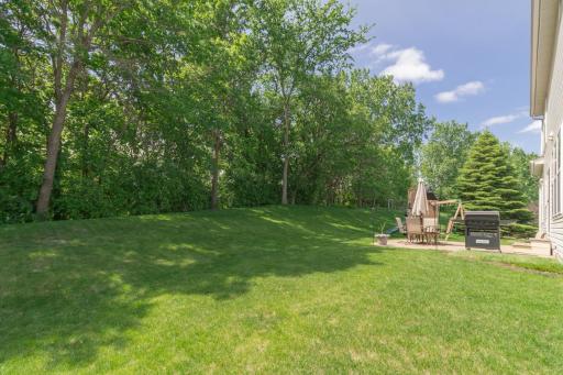 Beautiful flat backyard space on this .62 acre wooded lot.