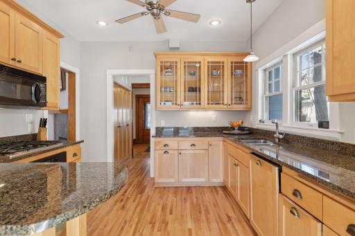 Granite counters, stainless appliances, newer cabinets and natural light grace your gourmet kitchen
