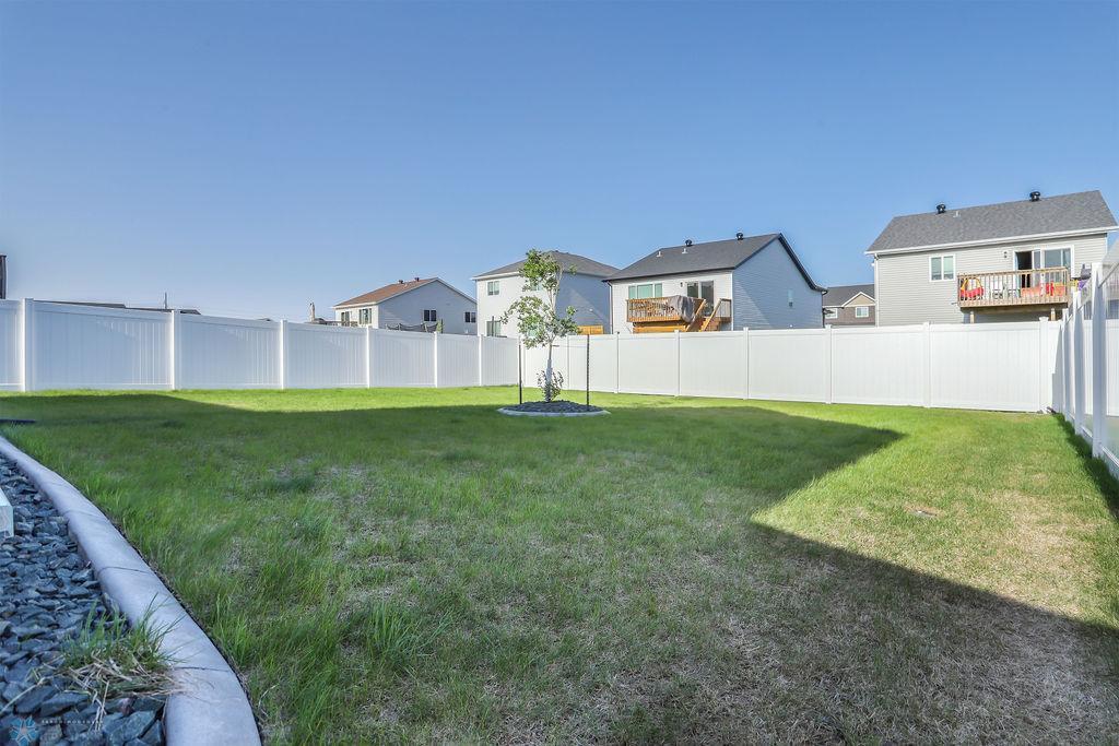 Fully fenced back yard.
