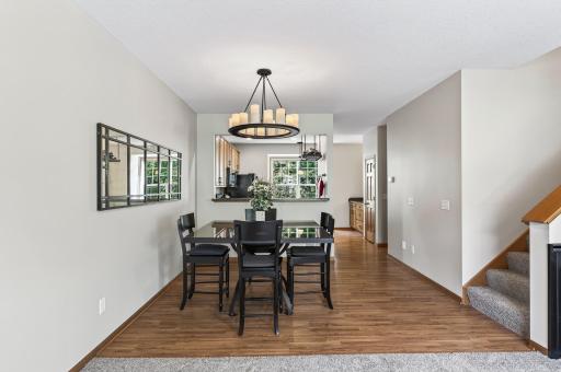 Here you can see the spacious dining room that looks through to the kitchen. This space is great for entertaining friends and family.