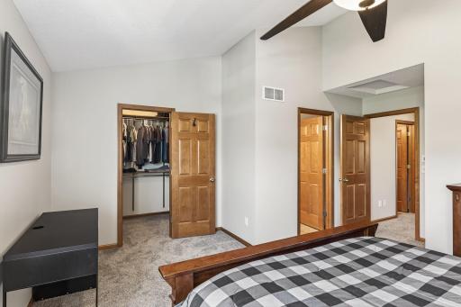 From this angle you can see the generously sized walk-in closet and the door to the en-suite bathroom on the right. All of the doors throughout the home are solid core 6-panel maple.