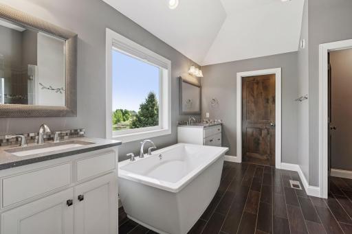 Dual vanities, separate soaking tub and shower