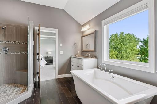 Owner's suite private bath with tile floors