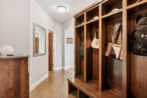 Mudroom with custom lockers and key drop/phone charging area
