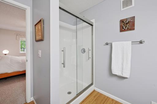 Newer shower and flooring in primary bath room