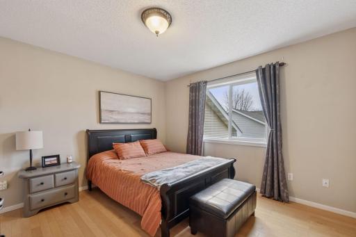 spacious primary bedroom, attached to bathroom