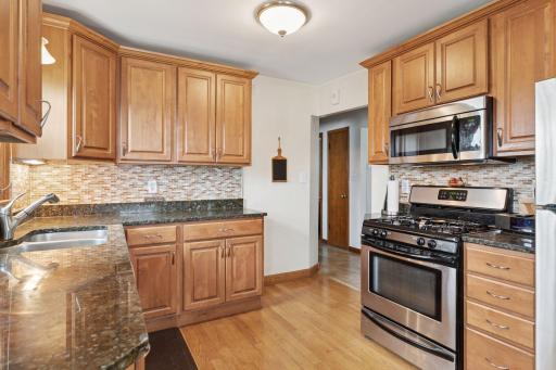 Renovated kitchen with stainless appliances and granite counters!
