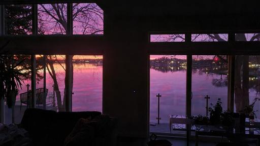 You'll love watching stunning sunsets through the expansive picture windows
