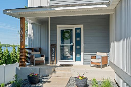 Charming front porch welcomes you in, this home is filled with custom details