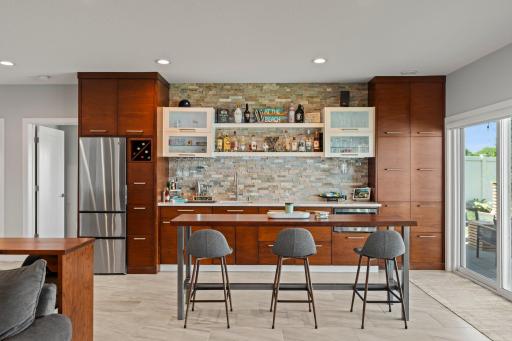 Enjoy serving up drinks at the stylish bar