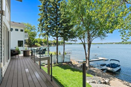 Step out to the deck for sweeping views of the lake and the perfect spot to lounge
