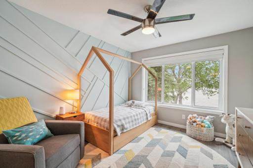 Upper level bedroom with beautiful accent wall