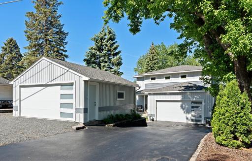 Front of home includes an attached & detached garage for convenience