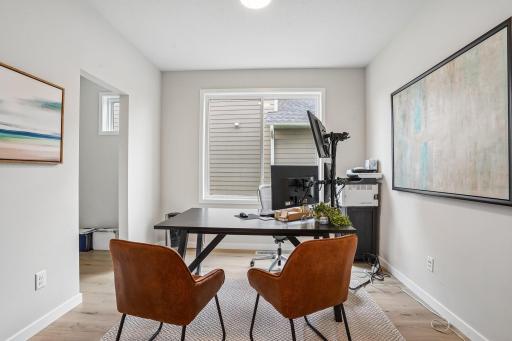 A stunning flex room with French doors adds both charm and flexibility, perfect for a home office, study, playroom, or additional sitting area.