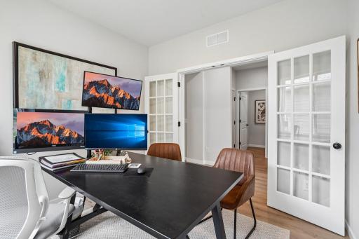A stunning flex room with French doors adds both charm and flexibility, perfect for a home office, study, playroom, or additional sitting area.