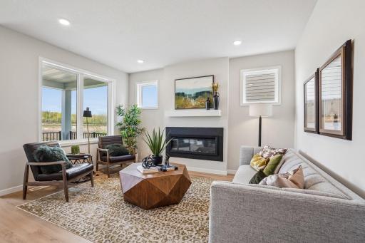 The Kendall offers a seamless flow into the gathering room with sleek electric fireplace for the cozy evenings.