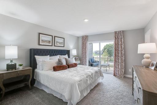 This primary suite is the oasis you deserve at the end of the day! Enjoy your own private covered deck! *Model home - colors and finishes will vary.