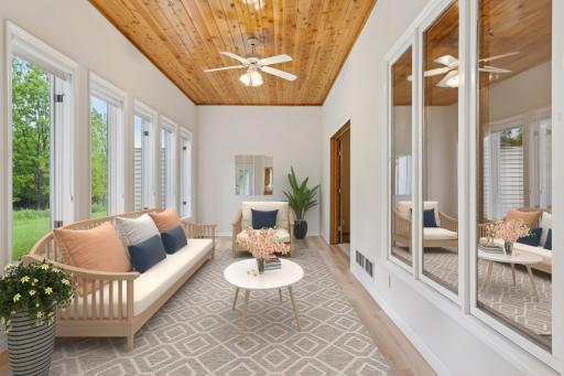Virtually staged to sun room to show furniture placement options