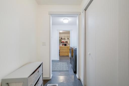 Additional laundry room storage which currently houses the cleaning supplies for this home. Neatly tucked away!