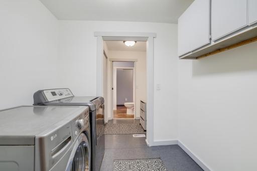 Additional storage in the laundry space and wall space to add more if needed.