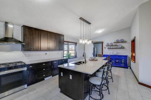 Your guest will feel welcomed and you will feel ready to host in this stunning kitchen space located right off the family room and dining area.