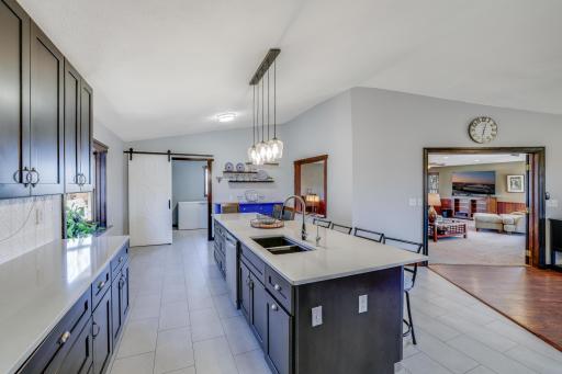 Another view of this spectacular space from the back corner of the kitchen. It really highlights how functional the sellers thought out the entire space with the addition.