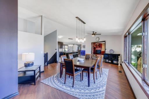 Stunning natural sunlight shines throughout the entire home, spotlighting pristine wood floors and high ceilings.