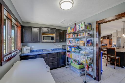 Did someone say a HUGE walk in pantry was on their list? You are in luck because this home has it and it is a showstopper!