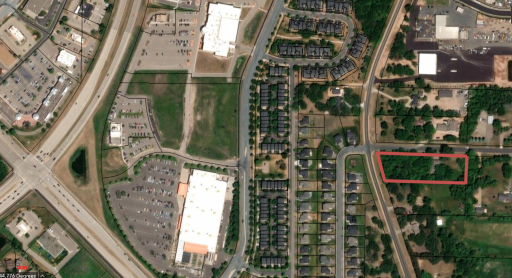 The aerial view of this property shows how awesome and convenient the location is. Complete privacy while you can walk to take in a movie at the local Marcus Theater!