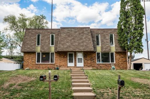 Unique opportunity to own a side by side duplex in the award winning Mounds View School District!