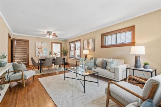 Bright and open main floor with pristine original hardwood floors