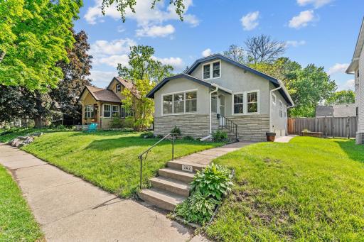 Great curb appeal with soon-to-be blooming peonies!
