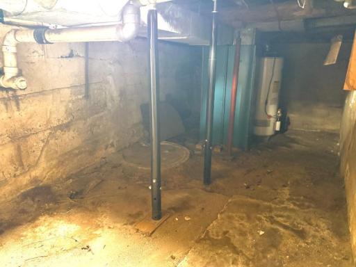 Small Basement Area- Nearly new water heater