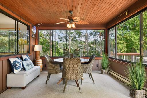 This 24x12 screened-in three season porch, featuring windows and heat, enhances the homeâs functionality and provides a versatile space perfect for entertaining and enjoying the lake year-round.