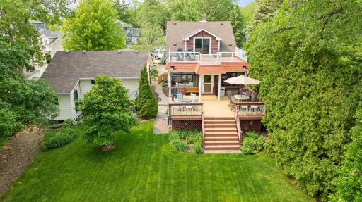 The screened-in 3 season porch w/heat on the lakeside along with 23x20 decking on home extends your living spaceâideal for dining, lounging, or enjoying lakeside evenings.