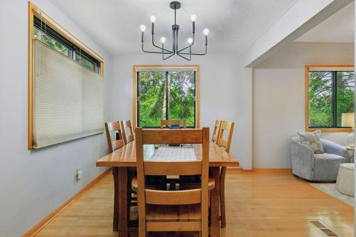 The dining area adjacent to the kitchenâwhether for formal meals or casual gatheringsâprovides a welcoming space where everyone can come together to enjoy meals and share their day.